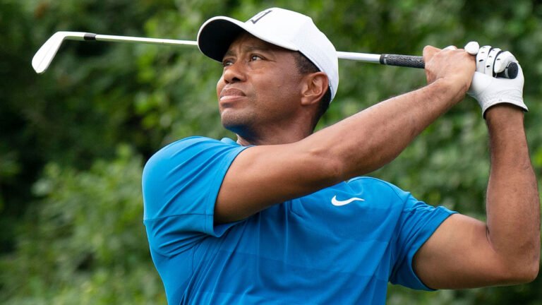 Tiger Woods cherishes a now-rare chance to compete alongside his rapidly improving teenage son Charlie at this weekend's family-focused PNC Championship taking place under weather concerns in Orlando, Florida. (KA Sports Photos / Wikimedia)