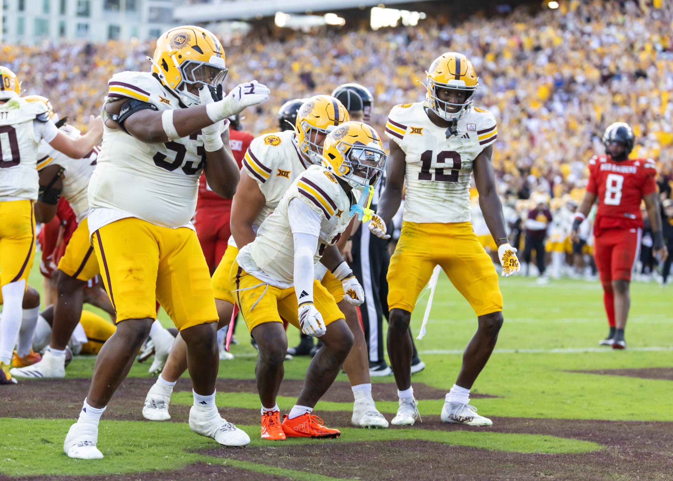- Oct 18, 2025; Tempe, Arizona, USA; Arizona State Sun Devils running back Raleek Brown (3) celebrates with offensive lineman Josh Atkins (53) and wide receiver Malik McClain (12) after scoring a touchdown against the Texas Tech Red Raiders in the fourth quarter at Mountain America Stadium. Mandatory Credit: Mark J. Rebilas-Imagn Images 
