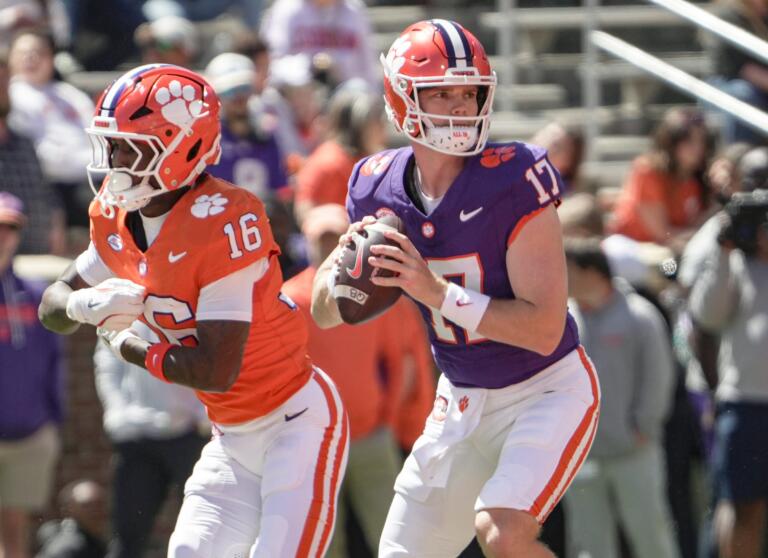 Clemson Quarterback Christopher Vizzina 17 Throws Near Running Back Chris Johnson Jr 16 During the First Half at the Annnual - Easysportz -